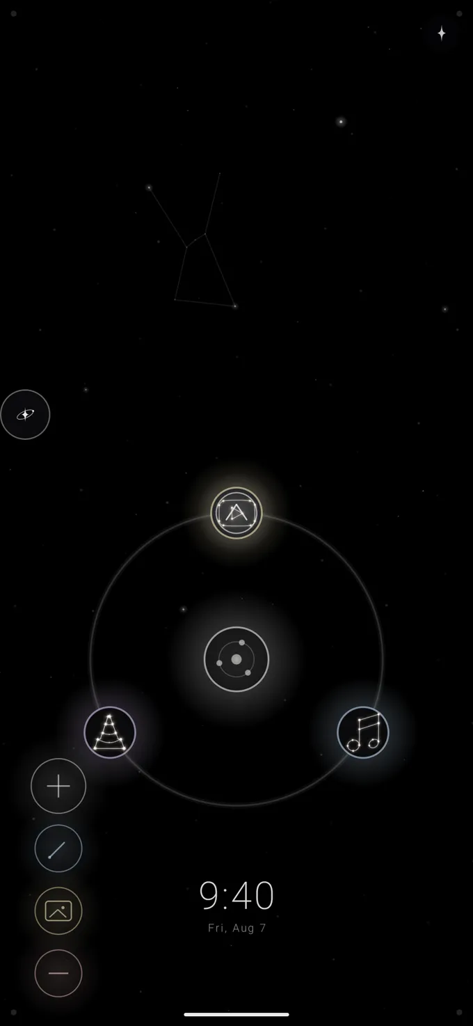 A folder-star opened into its own smaller ring of apps nested inside the launcher's sky.